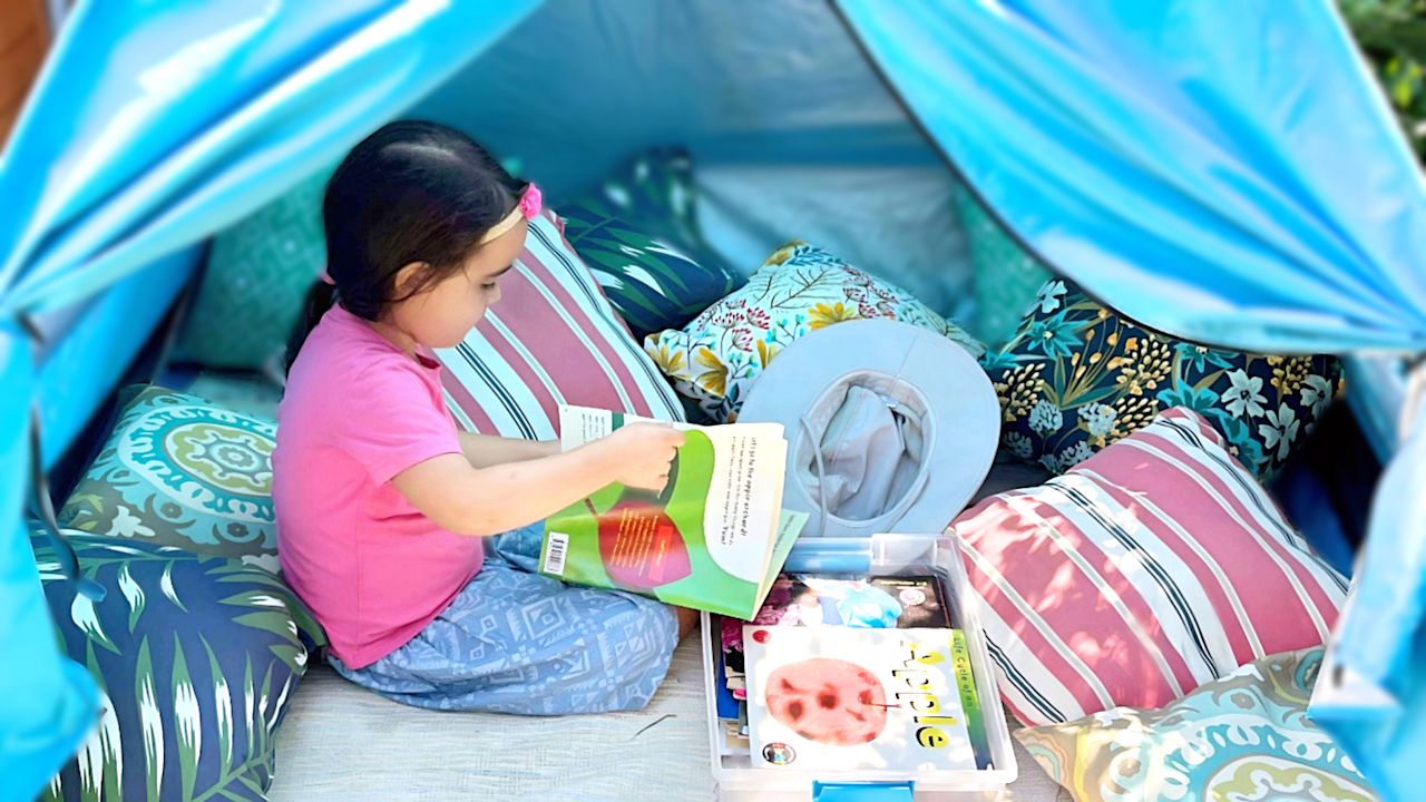 Child Care Articles - Girl Reading Book in Tent