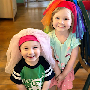 Child Care Curriculum - Children with Ballet Skirts on their Heads