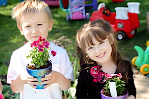 Green Child Care - Children Holding Flowers
