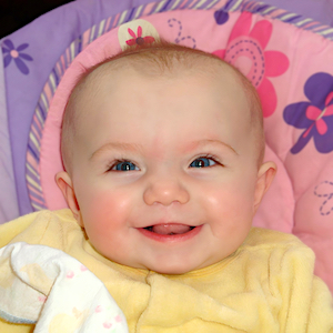 Infant and Toddler Care - Baby Girl Smiling
