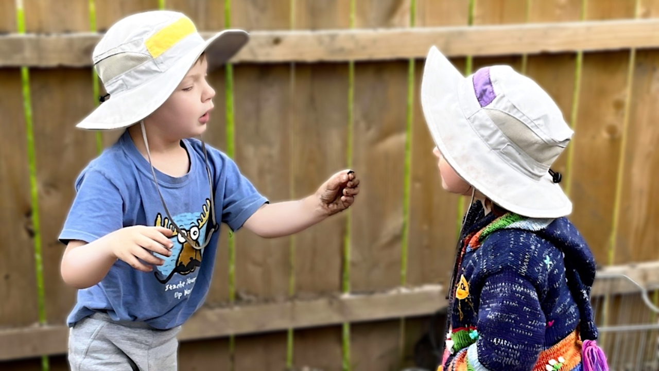 Parent Information - Boy Showing a Worm to a Girl
