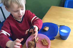 Child Care Menus - Boy Serving Himself Food