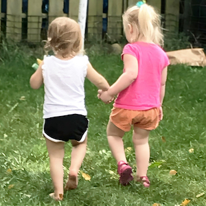 Child Care Policies - Two Girls Walking Away Holding Hands