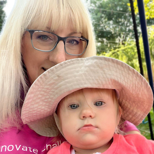 Child Care Safety - Amy with Toddler wearing a sun hat