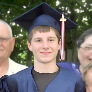 Child Care Testimonials - a young man in graduation garb