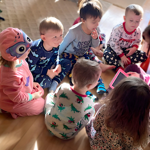 Family Child Care Program - Children Listening to a Story