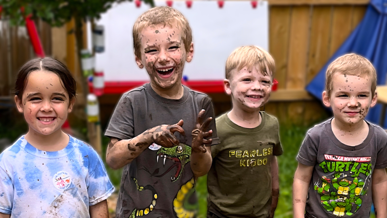 Messy Play - Children spattered with mud