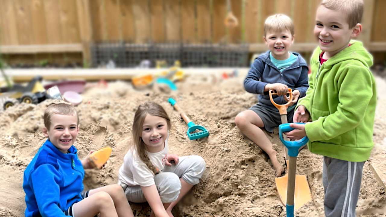 Parent Corner - Children Playing in Sandbox