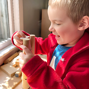 Play-Based Learning - Boy Stacking Blocks