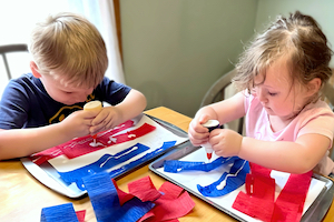 Preschool Child Care - Girl and Boy doing Art