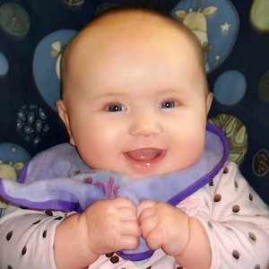 Quality Child Care Program - Baby Girl Smiling