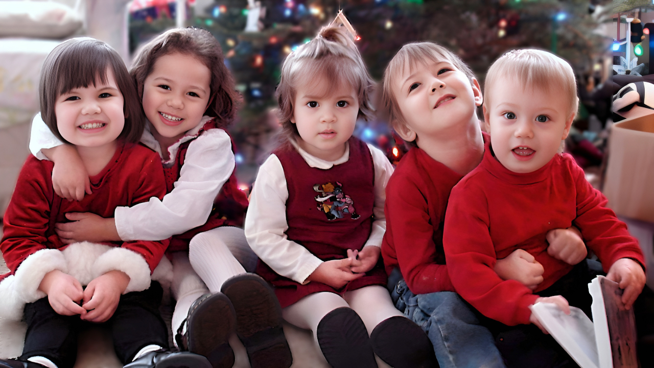 Child Care Site Map - Children in Red Smiling in Front of a Christmas Tree