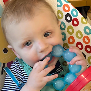Toddler Biting - Child Chewing on a Frozen Teether