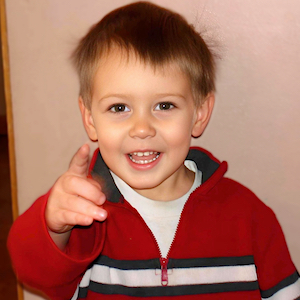 Toilet Learning - Boy Pointing and Smiling